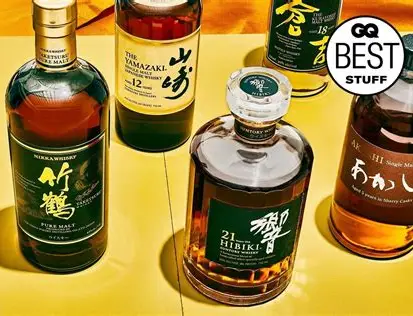 Best Japanese Whisky Bars Around the World Which Should You Buy? featuring elegant whisky glasses and bottles at a luxury bar counter